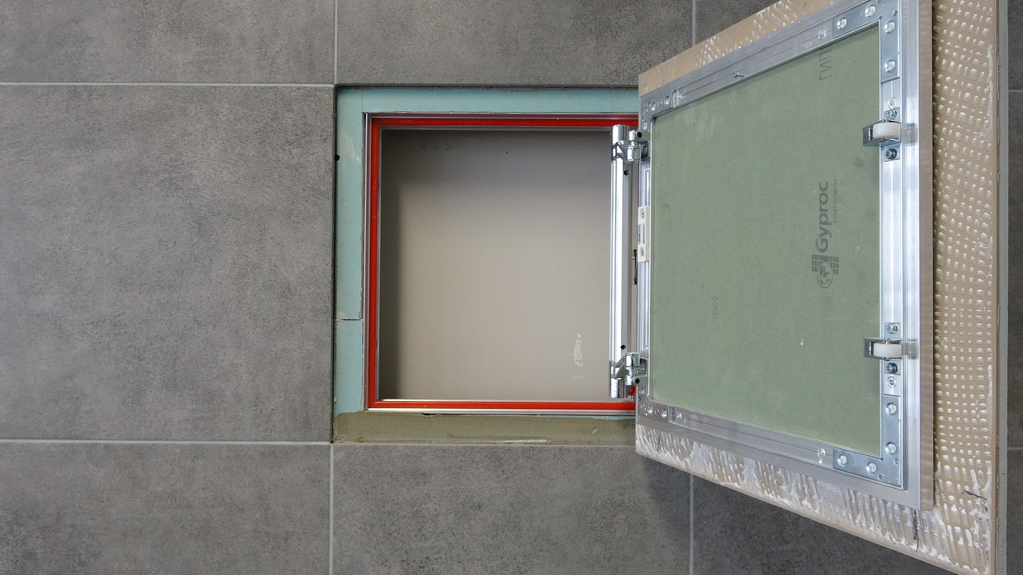 Concealed wall hatch for tiles with push-up door